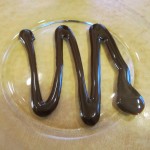 Drizzle plate with chocolate sauce before placing blintz on top