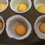Place vanilla wafers in lined muffin tins