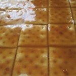 Drizzle crackers with the butter/brown sugar mixture