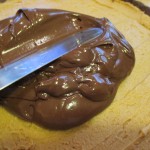 Spread melted chocolate over peanut butter filling